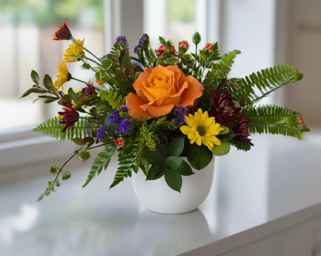 Fall flowers with roses with free delivery in Winnnipeg