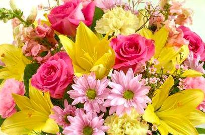 Yellow and hot pink flowers handtied are perfect for birthday flowers!