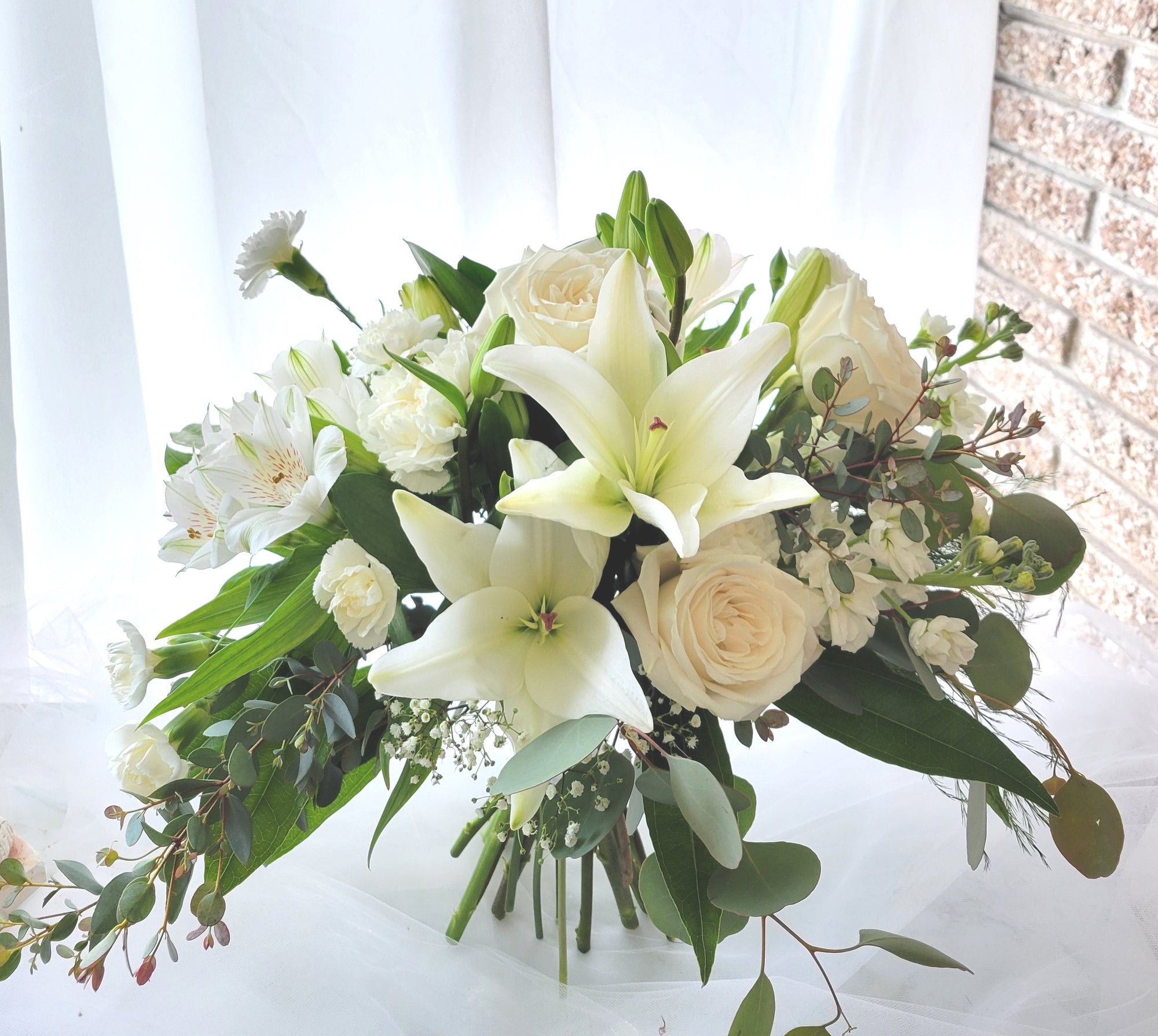 wedding bouquets white roses and lilies All white wedding bouquet with lily