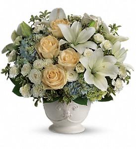 White and blue flowers hand crafted by florist in Winnipeg, suitable for sympathy flowers
