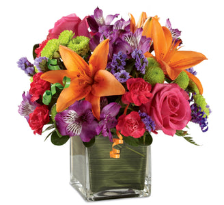 Orange lily with colorful roses, carnations and daisy to send some Birthday cheer.