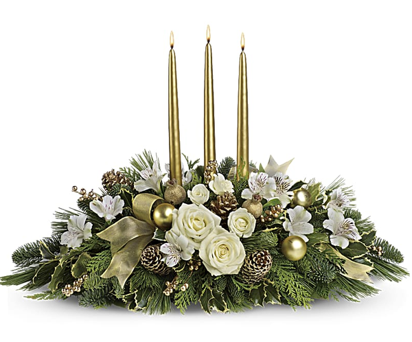 White Christmas arrangement with candles handcrafted by Valley Flowers, your florist in Winnipeg.