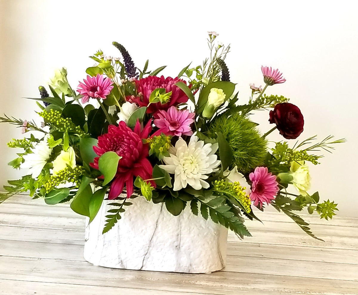 long lasting flowers in purples whites and pinks delivered in winnipeg