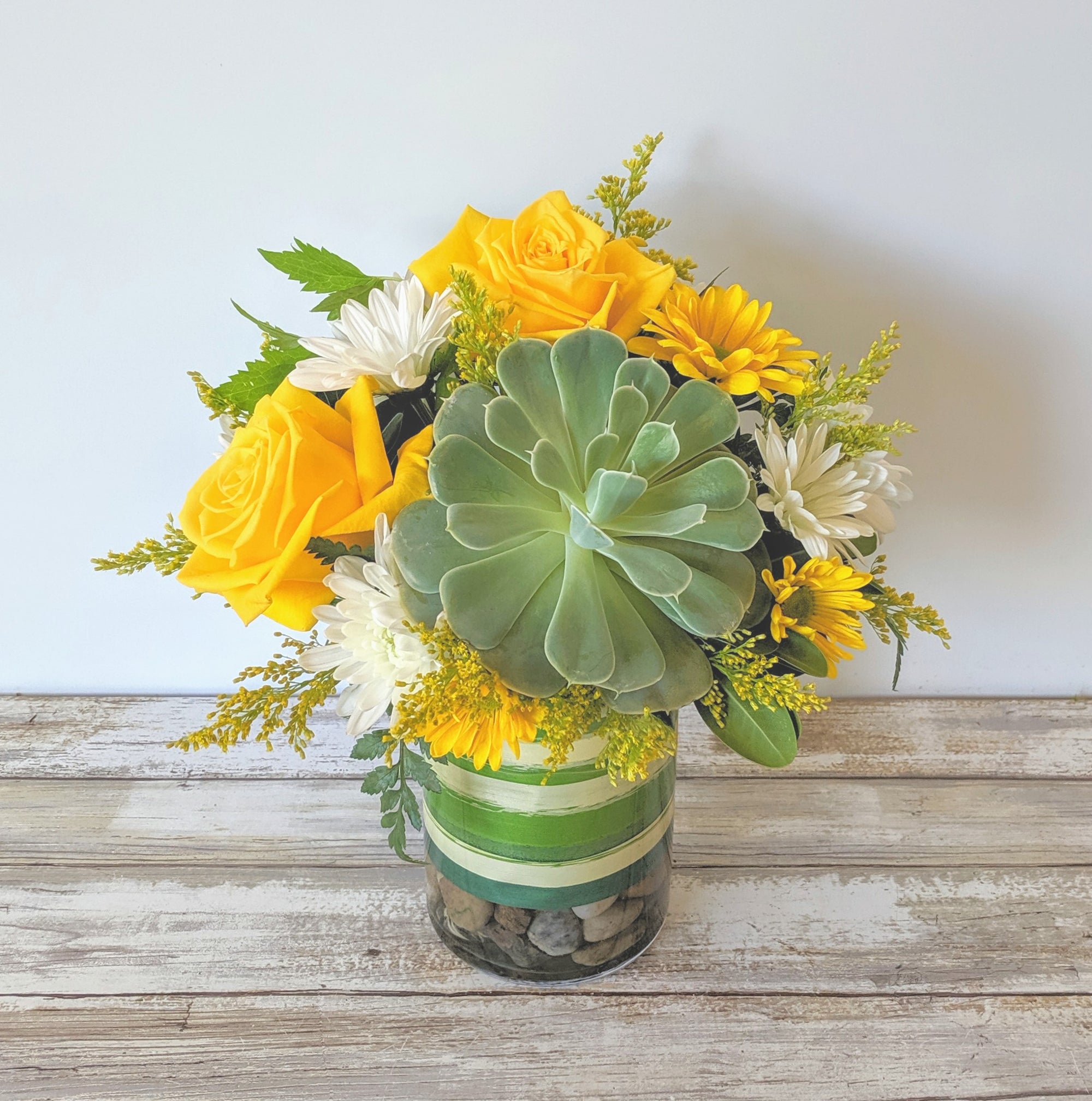Yellow roses and succulent exclusively designed here in our Winnipeg Floral Shop